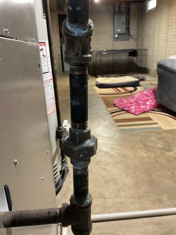 Performed scheduled furnace tune-up service, which included comprehensive system testing with multimeter readings confirming proper voltage at 48.6V. Inspected ductwork to assess cleaning requirements and evaluated furnace connections, noting some wear on plumbing components near the unit. System is functioning within normal parameters after service completion.