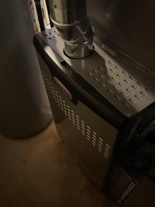 Performed scheduled furnace tune-up on residential heating system. Inspected heat exchanger and burner assembly, confirming proper operation with blue flame pattern. Checked electrical connections and control wiring for secure attachment and verified system safety controls were functioning correctly.