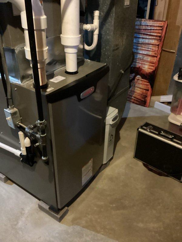 Performed scheduled MVP Heating Visit on residential HVAC system. Inspected furnace unit, ventilation components, and associated ductwork in utility area. Replaced air filter with new pleated filter to maintain system efficiency and proper air flow.