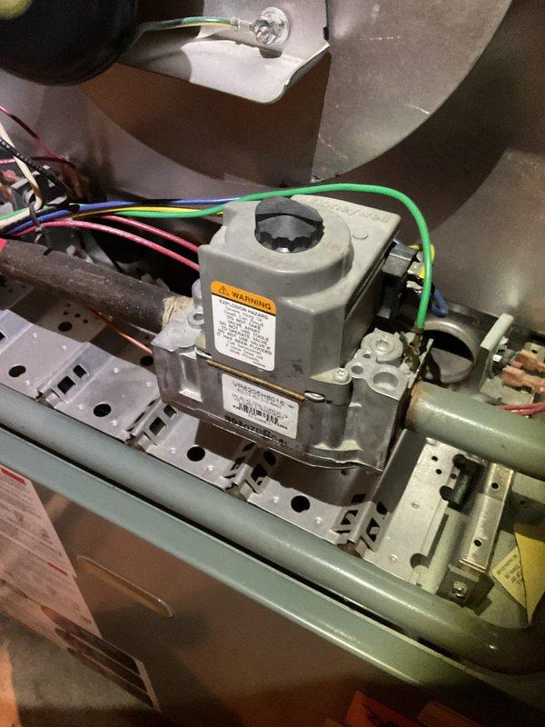 Performed diagnostic service on 12-year-old furnace exhibiting intermittent cold air issues. Conducted amperage testing with clamp meter on blower motor and verified proper operation of gas valve assembly. System is now functioning correctly with proper ignition sequence and consistent heat output.