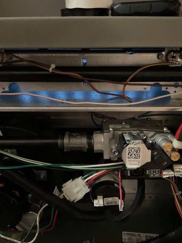 Responded to customer call for no heat with urgent warning displayed on thermostat. Diagnosed faulty control board and gas valve assembly. Replaced defective components, reconnected wiring harnesses, and verified proper system operation, restoring heat function.