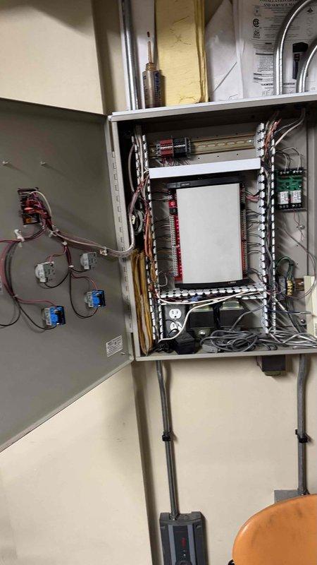 Diagnosed 20+ year old natural gas boiler system serving a 4-story commercial building with no heat complaint. Inspection revealed issues with the control center and electrical components. Examined the complex wiring connections in the electrical control panel and evaluated the boiler assembly, pumps, and associated piping infrastructure. Determined necessary repairs to restore heating functionality to the building's delta heating system.