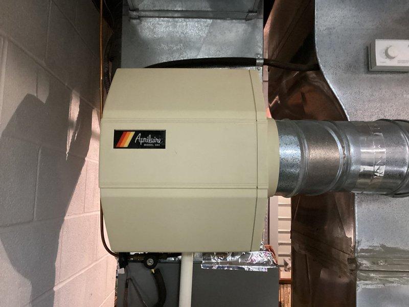 Performed diagnostic inspection on residential HVAC system in response to customer concerns about low humidity levels. Examined Aprilaire Model 500 humidifier connected to Lennox furnace system. Determined humidifier was functioning properly but required adjustment to optimal settings for current seasonal conditions to improve home comfort.