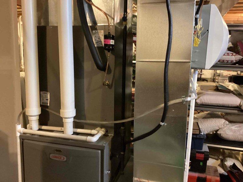 Responded to emergency call regarding basement flooding caused by a kinked humidifier line installed on 11/25. Upon inspection, located and corrected the kinked line, preventing further water damage. Verified proper drainage and operation of the Lennox furnace system after repair.