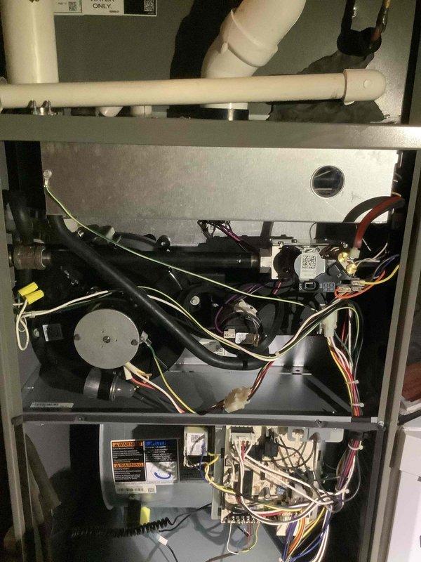 Performed scheduled maintenance on 3-year-old furnace. Inspected internal components including motor assembly, wiring connections, and PVC venting system. Identified deteriorated insulation/sealant at PVC pipe junction requiring attention; recommended renewal of service agreement to address this issue and maintain optimal system performance.