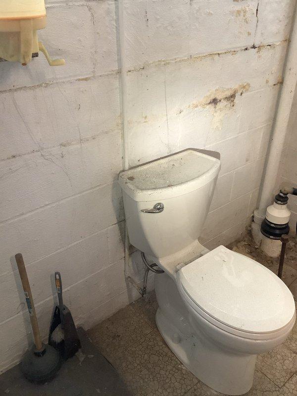 Responded to service call for leaky shower drainpipe in 70-year-old home. Upon inspection, discovered significant oxidation and corrosion on copper drain assembly beneath tub. Replaced damaged pipe sections, sealed all connection points, and verified proper drainage with pressure test. No further leakage observed after repair.