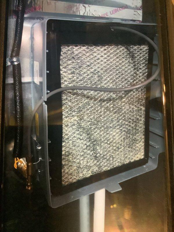 Performed routine maintenance on heating system as part of MVP service. Combustion analysis showed excellent efficiency with readings of 97.4%, CO at 18ppm, and stack temperature at 90°F. Inspected iWave air purifier which customer reported was installed incorrectly, serviced and verified proper operation. Successfully installed customer-provided ecobee thermostat.