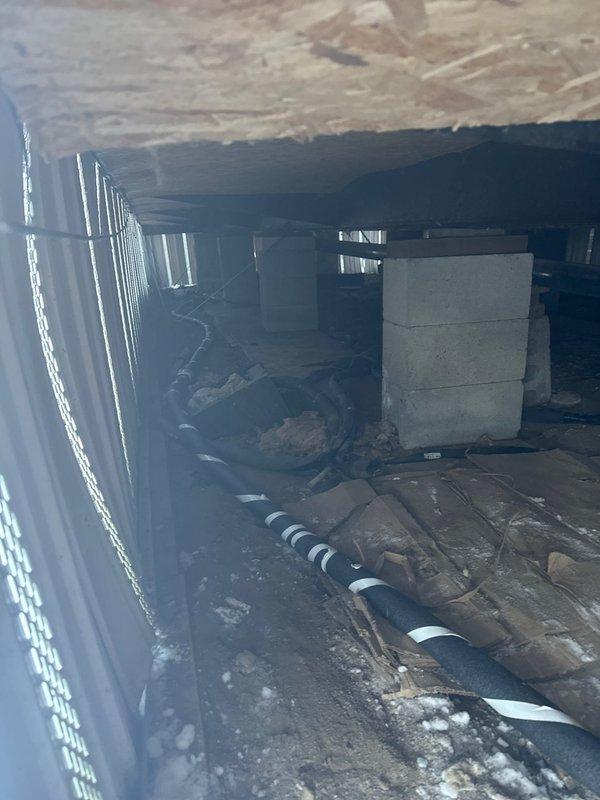 Responded to service call for heat tape replacement in crawlspace. Inspected existing installation in confined area with exposed plumbing and mechanical components. Customer currently has no water service. Replaced damaged heat tape on insulated pipes to restore proper freeze protection system functionality.