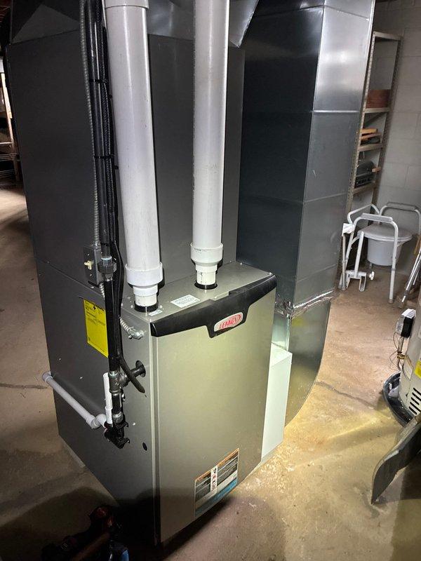 Performed scheduled MVP furnace maintenance service on Lennox unit. Inspected control board and wiring connections for proper operation. Examined ventilation system including PVC exhaust/intake pipes and verified appropriate ductwork connections.