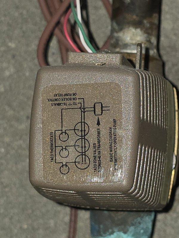 Completed routine maintenance on a 2-year-old heating system. Inspected expansion tank connections and copper piping network in utility area. Examined relay/control module wiring and connections, confirming all components are functioning properly.