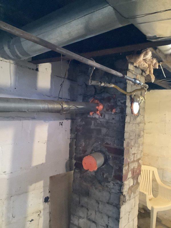 Completed estimate for replacement of existing heating and cooling system in a small residential property (under 1500 sq.ft.) with basement installation. Assessment revealed deteriorating connection points in the existing plumbing infrastructure and an aging furnace system with visible combustion issues. Recommended Lennox gas furnace with vertical upflow/downflow configuration and matching air conditioning system to replace the current equipment.