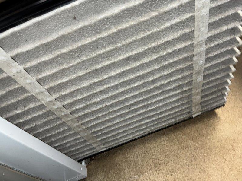 Performed comprehensive furnace tune-up, including inspection and cleaning of pleated air filter which showed moderate dust accumulation. Examined complete HVAC system including the furnace unit, PVC ventilation pipes, electrical components, and connected ductwork. Evaluated ductwork condition to assess need for cleaning service as requested.