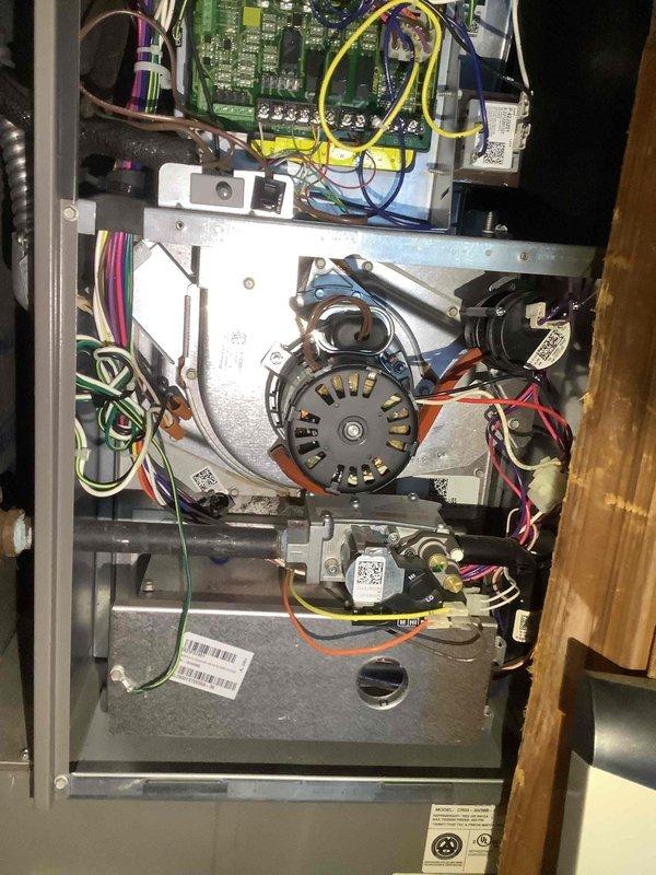 Performed scheduled MVP heating maintenance on 2-year-old system. Inspected furnace interior components including fan motor assembly, circuit board, and electrical connections. Examined insulated ductwork, mounting brackets, and copper lines for proper installation and condition. All components functioning within normal parameters.