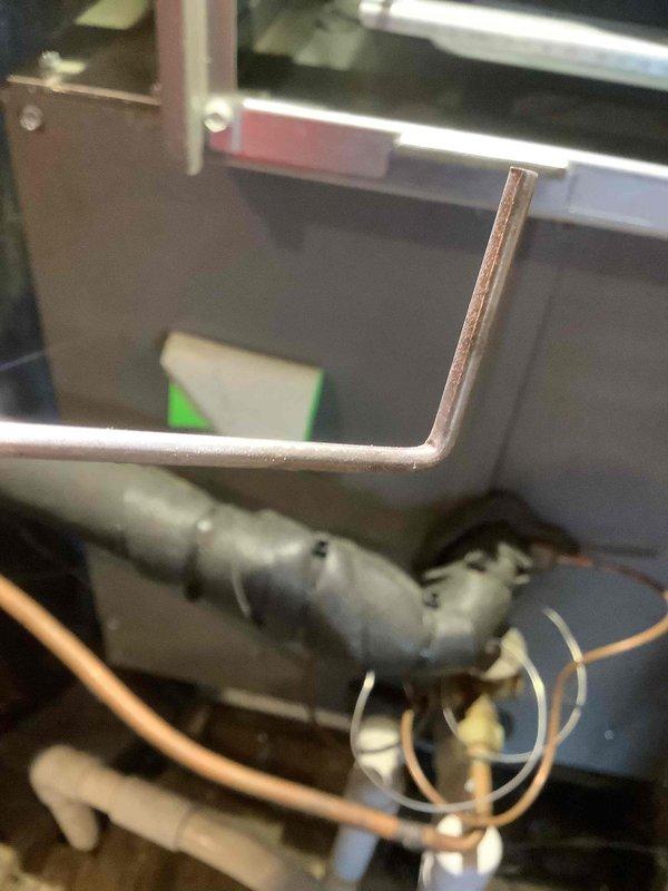 Performed scheduled MVP heating maintenance on 2-year-old system. Inspected furnace interior components including fan motor assembly, circuit board, and electrical connections. Examined insulated ductwork, mounting brackets, and copper lines for proper installation and condition. All components functioning within normal parameters.