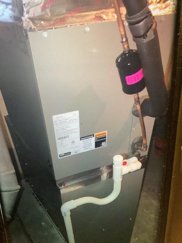 Performed MVP Heating Visit on 1-year-old system. Inspection revealed significant frost buildup on evaporator coils, indicating possible refrigerant issues or restricted airflow. Documented condition with photos and tagged system components for follow-up service.