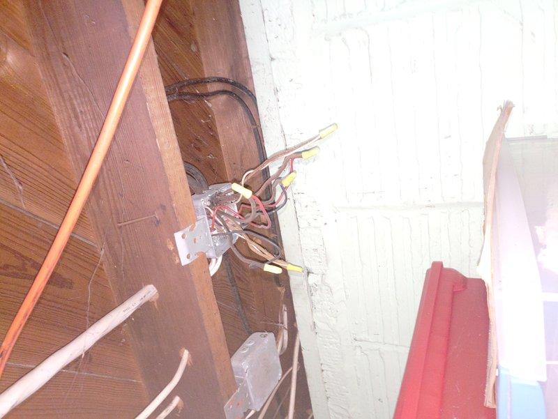 Diagnosed and repaired a non-functioning row of circuit breakers in a dual-row panel of a 90-year-old home. Inspection revealed loose connections at junction box feeding the affected row; rewired and secured connections with appropriate wire caps, restoring full functionality to all circuits. Verified proper operation of both rows of breakers after repair completion.