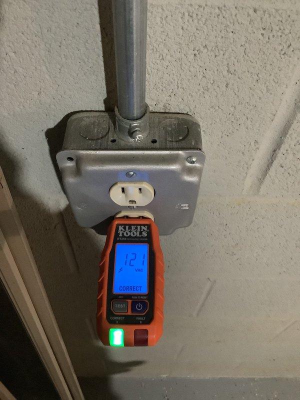 Responded to customer-reported issue with non-functioning basement electrical outlets. Performed comprehensive testing using Klein Tools voltage tester, which confirmed proper voltage readings of 120-121 VAC across multiple outlets. Verified all receptacles were correctly wired and functioning properly with "CORRECT" indication on diagnostic equipment. All basement outlets now operational.