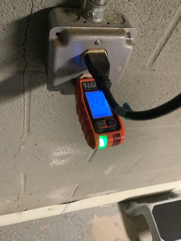 Responded to customer-reported issue with non-functioning basement electrical outlets. Performed comprehensive testing using Klein Tools voltage tester, which confirmed proper voltage readings of 120-121 VAC across multiple outlets. Verified all receptacles were correctly wired and functioning properly with "CORRECT" indication on diagnostic equipment. All basement outlets now operational.