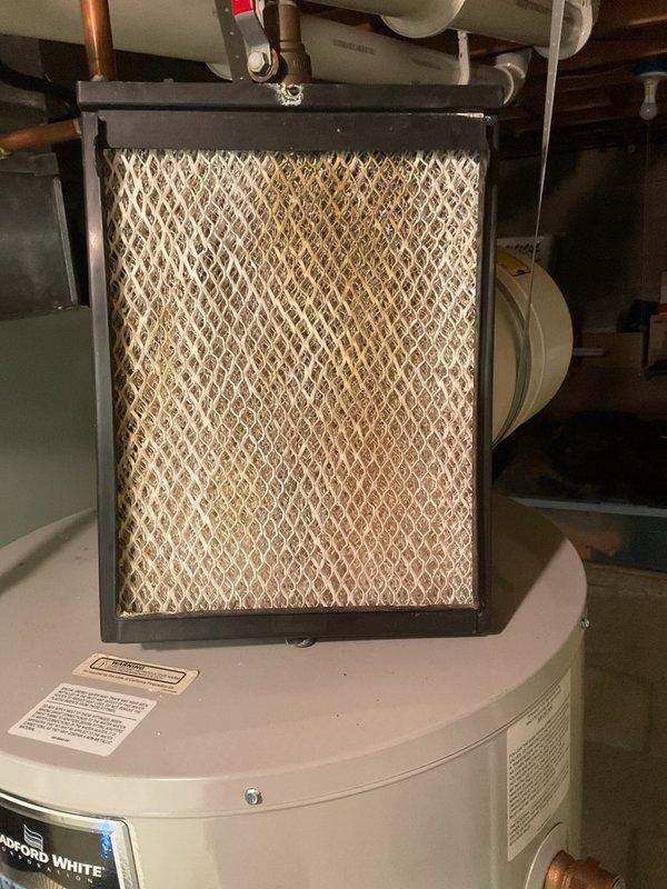 Performed MVP Furnace tune-up service. Inspected system and identified heavily soiled air filter requiring replacement. Filter showed significant dust accumulation affecting system efficiency. Also examined drainage components which displayed minor mineral buildup but remain functional.