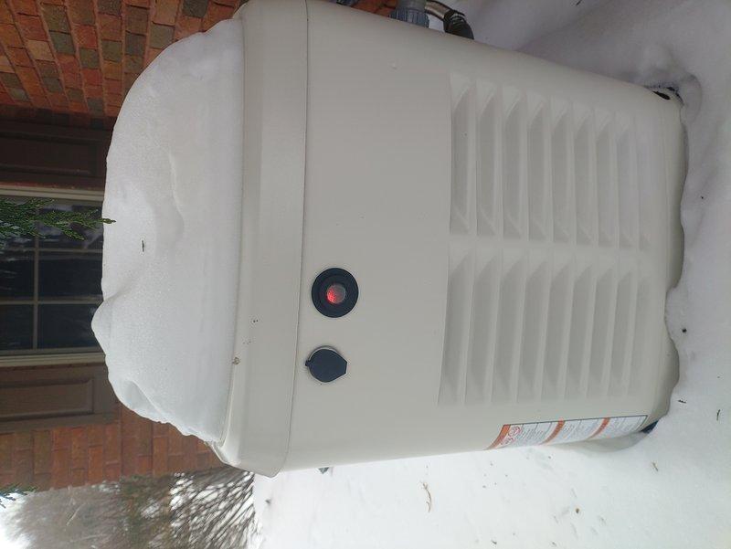 Responded to service call for generator with inactive green indicator light and illuminated warning light. Performed diagnostic testing using vehicle battery to verify electrical connectivity and control systems. Inspected exterior unit showing frost accumulation which was affecting operation. Reset system and restored normal indicator function.