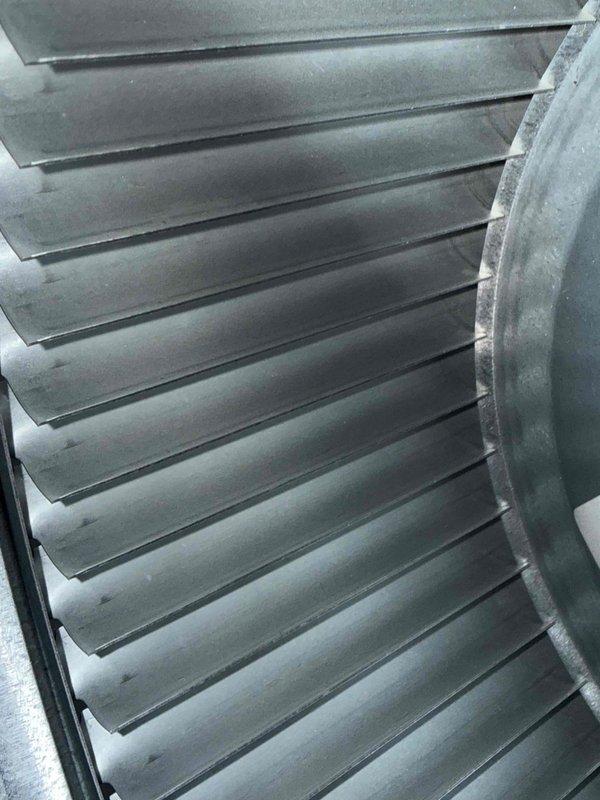 Performed comprehensive tune-up service on 2-year-old furnace under promotional special. Inspected blower wheel assembly for proper operation and dust accumulation. Examined mounting brackets and hardware for secure attachment and signs of wear, noting all components are functioning within manufacturer specifications.