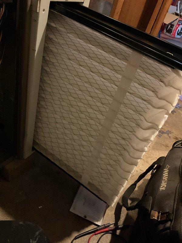 Performed MVP furnace maintenance service including inspection and documentation of existing air filters. Found current filters showing moderate dust accumulation but still in serviceable condition. Documented filter condition with photos for service record and future reference.