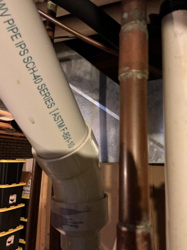 Replaced incorrect vent pipe on hot water heater that failed inspection. Installed proper code-compliant PVC vent pipe with appropriate fittings, ensuring proper ventilation for the system. Final installation now meets required inspection standards.
