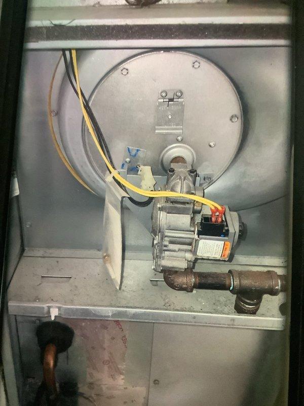 Performed scheduled MVP Heating maintenance service on the system. Inspected the main control board and electrical connections within the control panel, confirming all wiring was secure and properly connected. Examined the blower assembly and motor components, noting normal wear on the gas valve and slight oxidation on copper fittings, but all components operating within specifications.