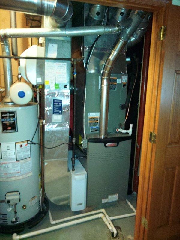 Successfully completed installation of a new 80% FRN furnace with matching Lennox AC outdoor unit. System was properly connected to existing ductwork in the mechanical room, with all necessary electrical and refrigerant lines installed according to manufacturer specifications. Final inspection confirmed proper operation of the complete heating and cooling system.