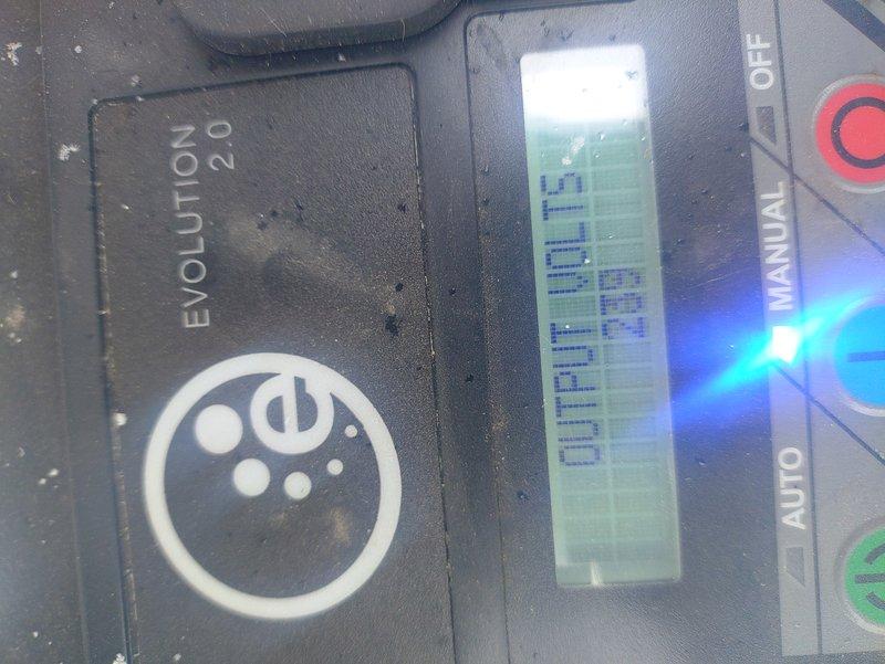 Responded to service call for generator that failed to complete test run after three attempts, resulting in red fault light. Diagnosed issue using Evolution 2.0 controller. Performed system reset and verified proper operation by running unit through test cycle. Generator now functioning correctly with controller displaying normal parameters in AUTO mode.