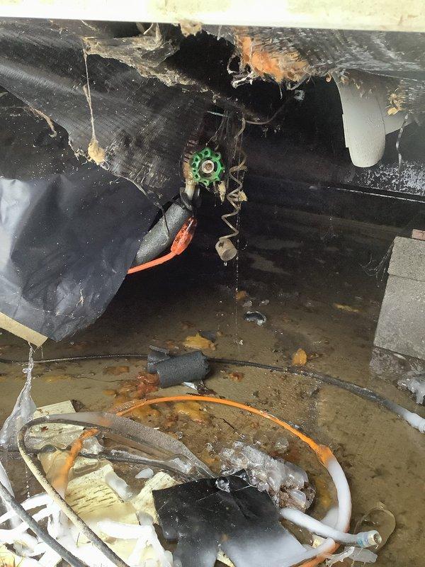 Responded to frozen waterline service call at mobile home. Inspected crawlspace for freeze breaks, finding damaged insulation and compromised PEX tubing at connection points. Installed heat tape on vulnerable water lines and replaced toilet internal components as requested.