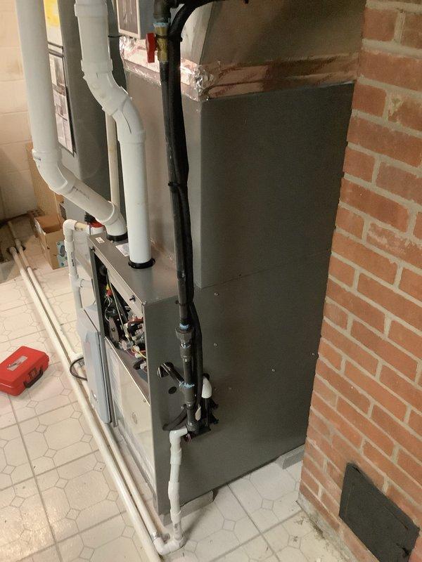 Successfully installed 90% efficiency furnace as a secondary heating system. Completed all necessary PVC venting connections and verified proper operation with temperature readings showing 73.3 degrees on the supply line. All seams properly sealed and system functioning within manufacturer specifications.