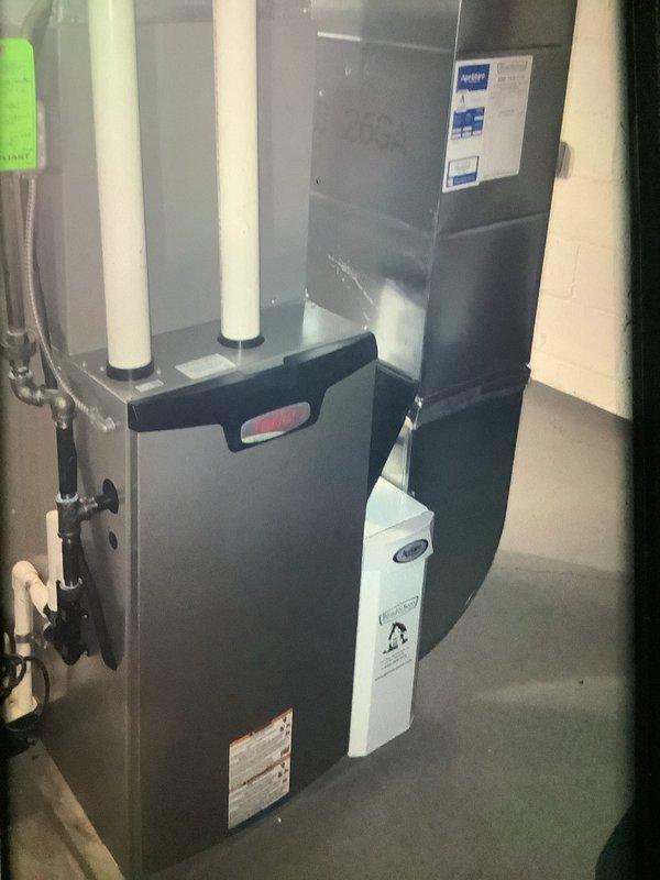 Performed scheduled MVP Heating Visit on a 3-year-old system. Inspected furnace unit and air handler, documented condition with photos. Examined air filter which showed normal dust accumulation, appears to need replacement soon.