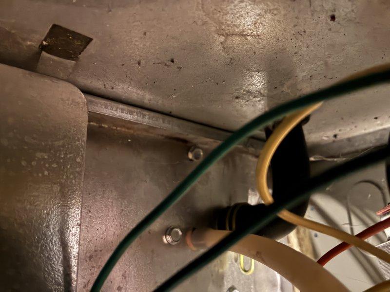 Responded to service call for 13-year-old furnace displaying efficiency error. Upon inspection of internal components, accessed control board and wiring connections to diagnose issue. After examination of blower assembly, circuit board connections, and heat exchanger, completed necessary repairs to restore proper system operation.