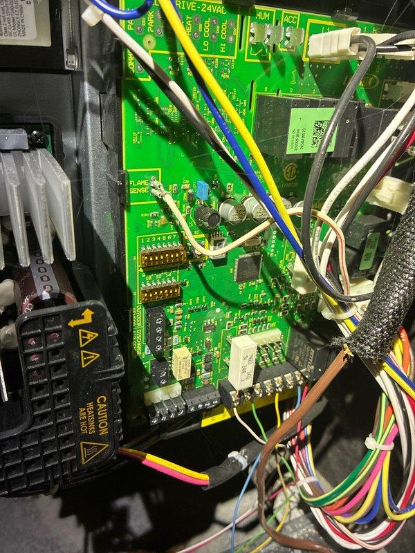 Completed annual maintenance on 1-year-old heating system (MVP Heating Visit). Inspected control board connections and flame sensor for proper operation. Checked date-stamped components (8/2023) and verified integrity of copper pipe connections and valve fittings. System functioning within normal parameters after service.