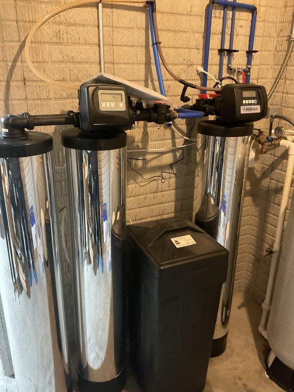 Responded to service call for leaking reverse osmosis system. Upon inspection, identified loose fittings at connection points following customer's recent filter replacement. Tightened all fittings, replaced damaged O-rings, and performed pressure test to verify repair. System now functioning properly with no leaks observed.