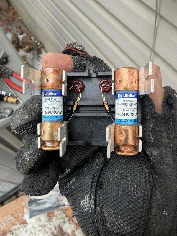 Successfully installed a new 90K BTU air conditioning system with proper placement of the outdoor unit on a secure pad adjacent to the home's exterior. Completed all electrical connections, including installation of a 30A FNR Littelfuse disconnect assembly for safe operation and code compliance. System was tested and confirmed to be functioning as designed.