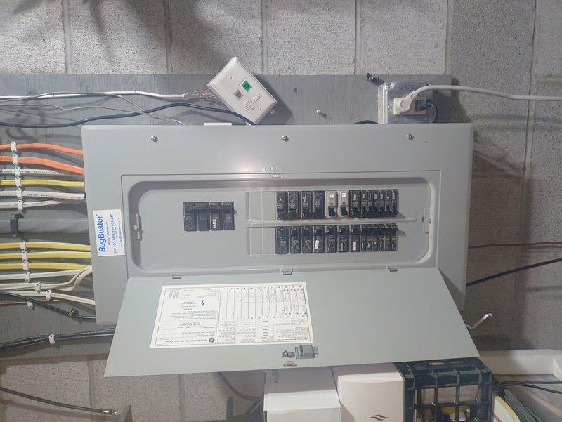 Conducted comprehensive evaluation of customer's existing electrical panel for exterior home lighting installation project. Inspected two circuit breaker panels: primary GE panel containing approximately 20-24 breakers (primarily 15A) and secondary panel with associated wiring infrastructure. Assessment completed to determine capacity and requirements for proposed exterior lighting system.