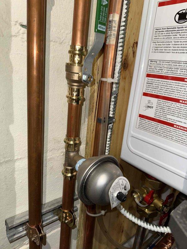 Performed tune-up on 31-year-old MVP boiler. Identified significant frost and moisture accumulation inside the unit, inspected copper piping system and pressure gauge. Confirmed customer's request for biannual maintenance schedule. Unit was non-operational upon arrival with no A/C function.