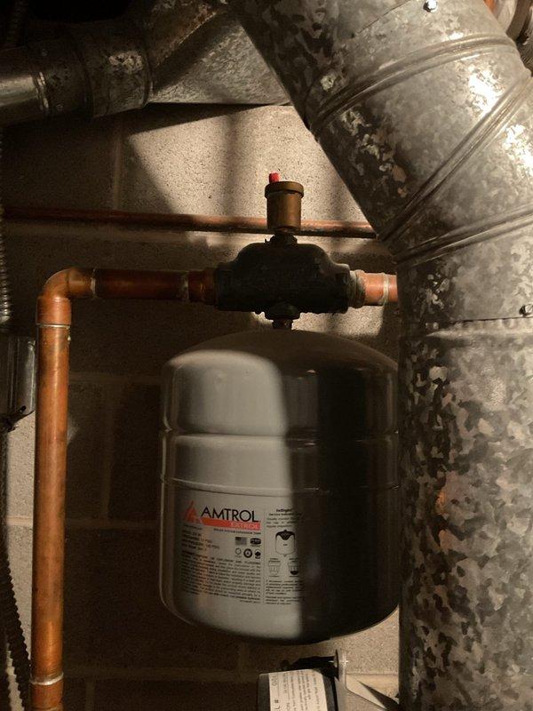 Performed routine maintenance visit on 7-year-old boiler system. Inspected heat exchanger components and verified proper operation of expansion tank. Confirmed right-hand boiler functionality as requested.