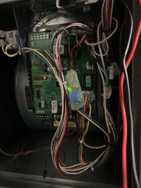 Performed routine BS-MVP heating maintenance on a 5-year-old system. Inspected control board circuitry and connections, noting all wiring harnesses were properly secured and the green status LED was operational. Used hex key to access and service internal components as part of the preventative maintenance protocol.