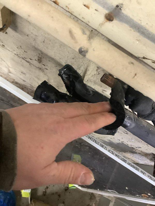 Responded to emergency call for burst pipe in 80-year-old residential property. Located and accessed aging pipe system in utility room, where significant water leakage was occurring near valve connections. Successfully repaired the compromised section, replaced corroded fittings, and verified system integrity with pressure testing to confirm resolution of the leak.