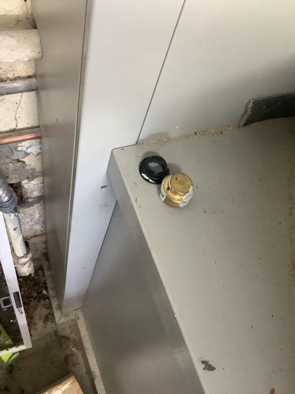 Responded to emergency call for burst pipe in 80-year-old residential property. Located and accessed aging pipe system in utility room, where significant water leakage was occurring near valve connections. Successfully repaired the compromised section, replaced corroded fittings, and verified system integrity with pressure testing to confirm resolution of the leak.