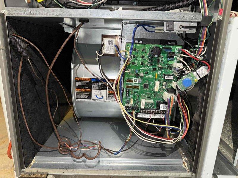 Performed routine maintenance on 5-year-old MVP heating system. Inspected control board connections and components, finding all wiring properly secured with no signs of deterioration. Examined mounting brackets and blower assembly, verifying proper installation and function.