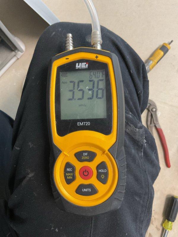 Performed routine maintenance on a 5-year-old furnace. Inspected blower motor assembly and electrical connections, confirming all wiring harnesses were properly secured with no signs of wear or damage. Conducted temperature differential testing with UEI EMT20 meter, obtaining readings of 35.36/64.01, which fall within normal operating parameters.