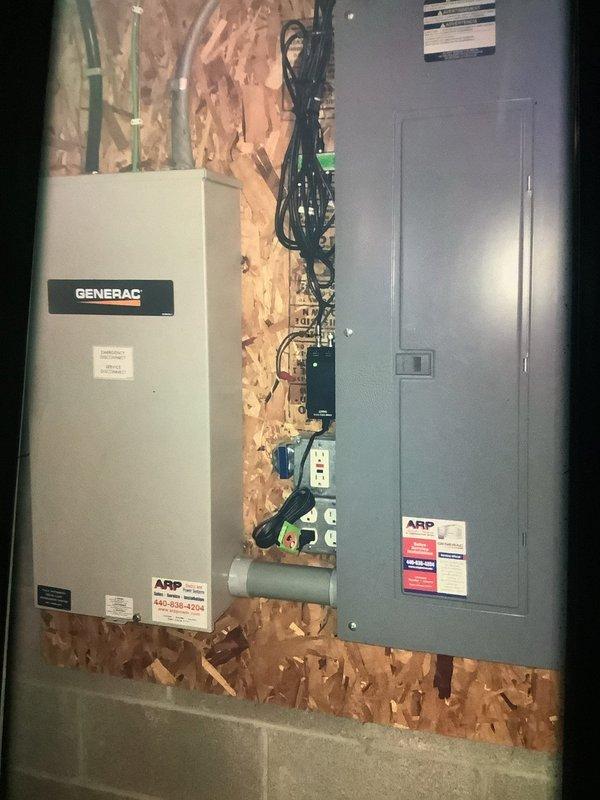 Performed routine maintenance on furnace of undetermined age. Inspected electrical connections including Generac transfer switch and main panel to ensure proper operation. Examined blower assembly which showed normal dust accumulation and wear; blades and motor mounting components remain in serviceable condition.