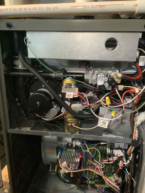 Performed annual maintenance on 1-year-old MVP furnace. Inspected interior components including circuit boards, wiring harnesses, and control modules. Checked all electrical connections and examined heat exchanger integrity. System functioning properly with no issues identified.