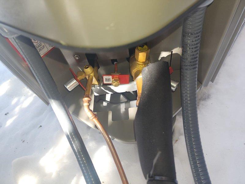 Responded to failed inspection callback regarding missing thumb gum and locking caps. Installed required locking caps on service valves and applied appropriate thumb gum sealant at the line set penetration through exterior brick wall to ensure proper sealing and code compliance.
