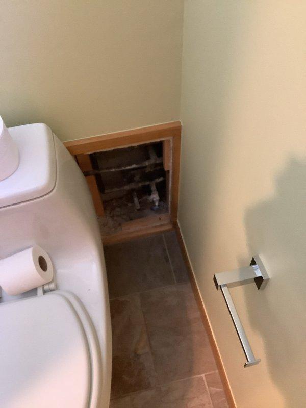 Responded to emergency call for burst pipe in 25-year-old residence. Accessed plumbing through bathroom wall panel behind toilet, identified source of leak, and completed necessary repairs to restore proper water flow and prevent further damage.