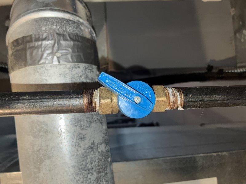 Performed scheduled MVP heating maintenance service. Inspected the furnace housing and ventilation system, confirming proper installation of ductwork and connections. Checked gas valve operation, verified blue handle valve was in the "on" position with secure threaded connections to supply lines.
